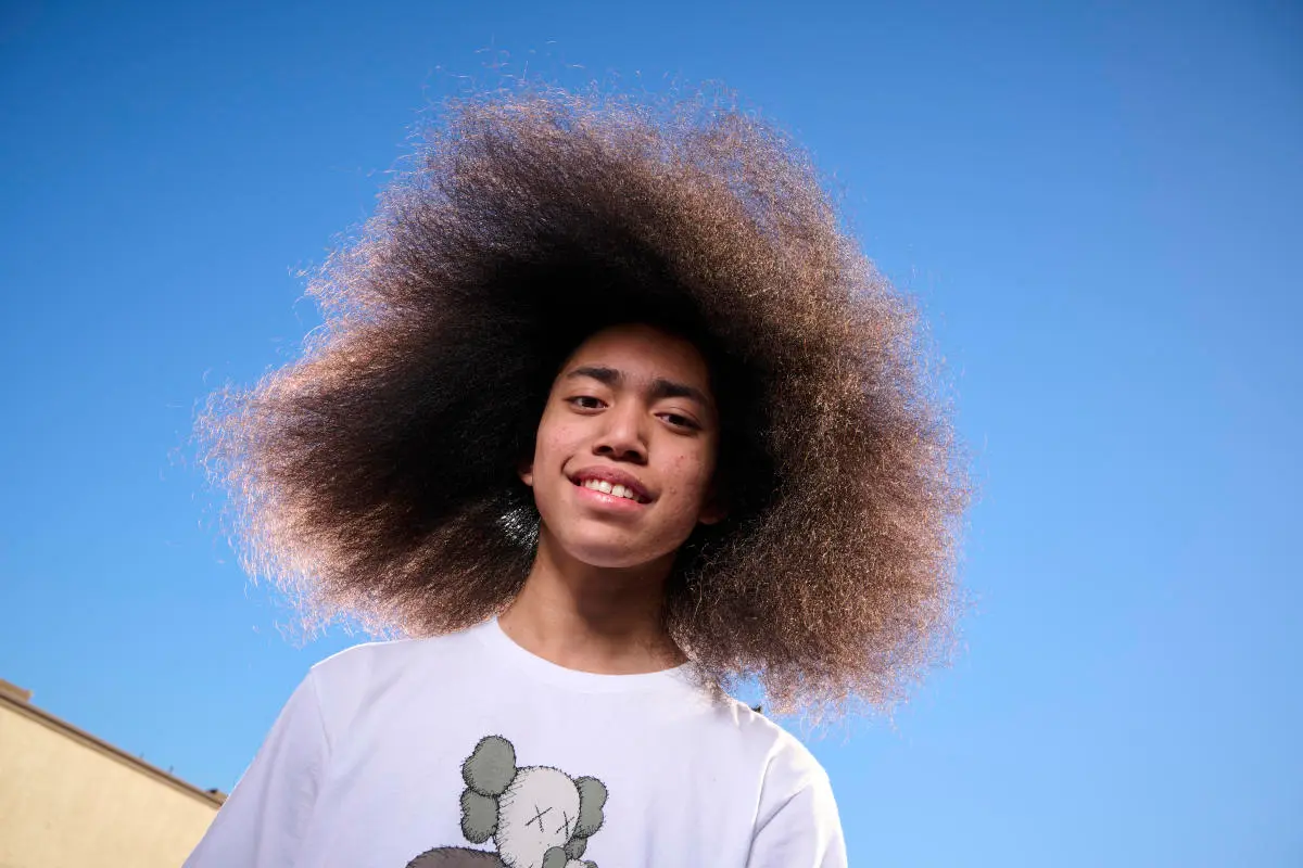 14 Year Old American Boy Holds Guinness Record For World's Largest Afro