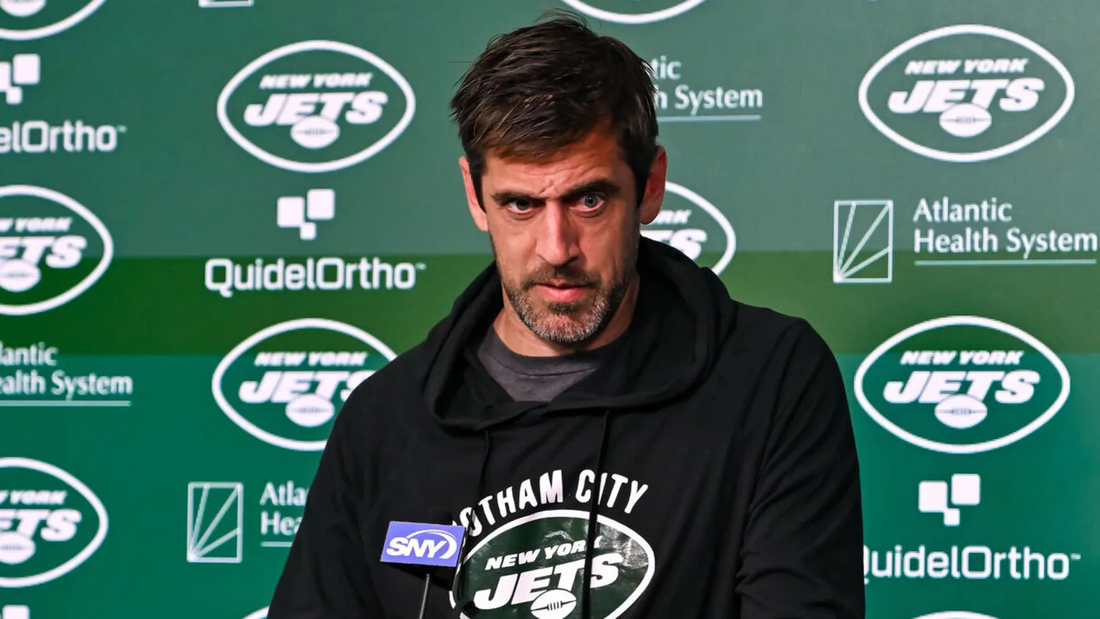 Aaron Rodgers Defends Off-Field Passions, Stresses Team Cohesion Amid Jets’ Upcoming Season