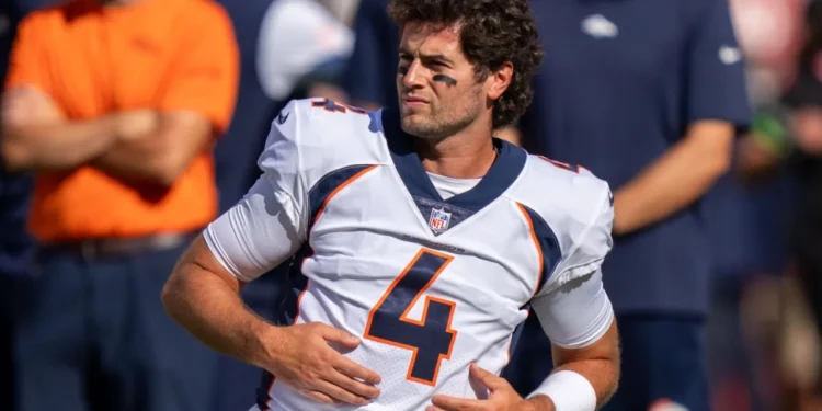 Battling for Dominance Jarrett Stidham's Tenacious Quest to Lead the Broncos