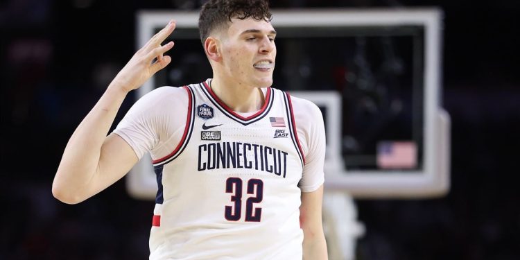 Meet Donovan Clingan: UConn's Towering Basketball Star Set to Transform the NBA's Defensive Game