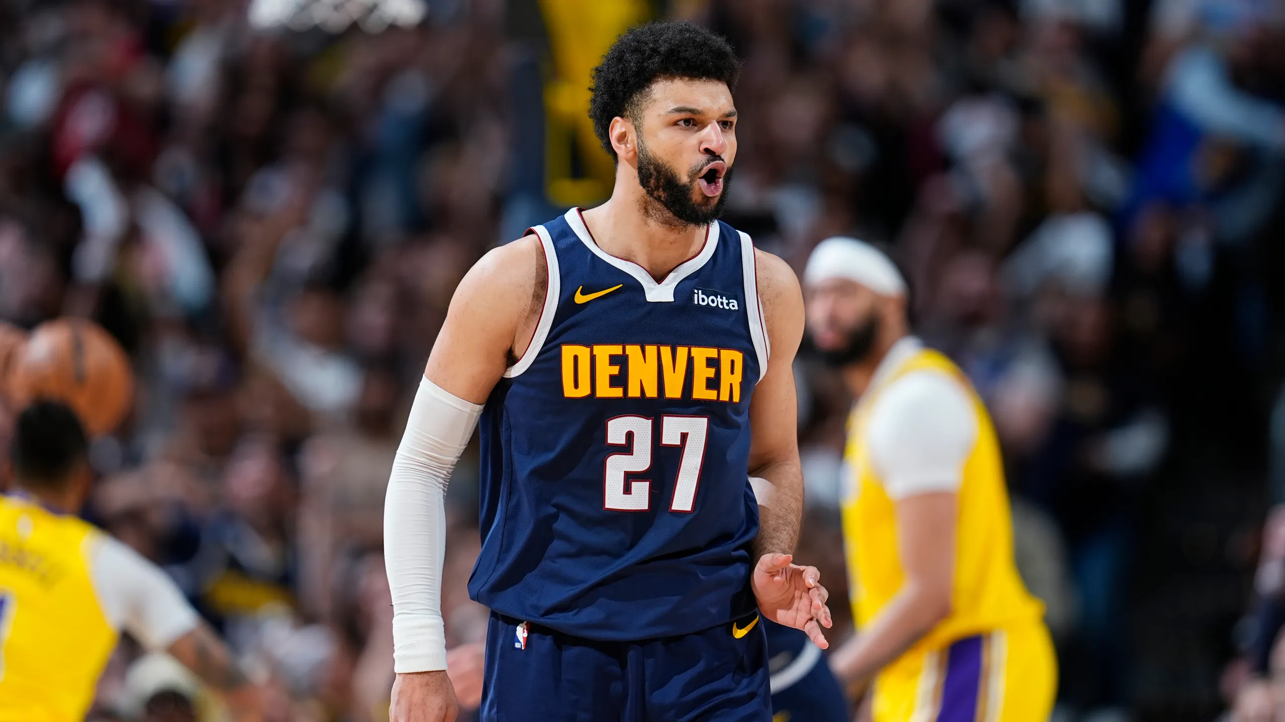 Watch Jamal Murray's Epic Half-Court Shot Revive Nuggets' Playoff Hopes Against Timberwolves