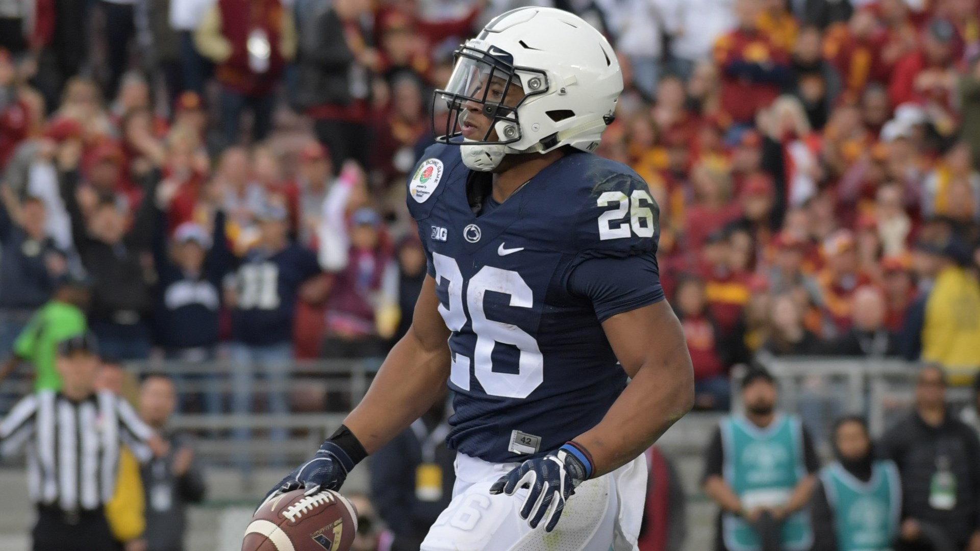 NFL Star Saquon Barkley's Dad Caught with Gun in NYC A Twist in the Athlete's Family Story----